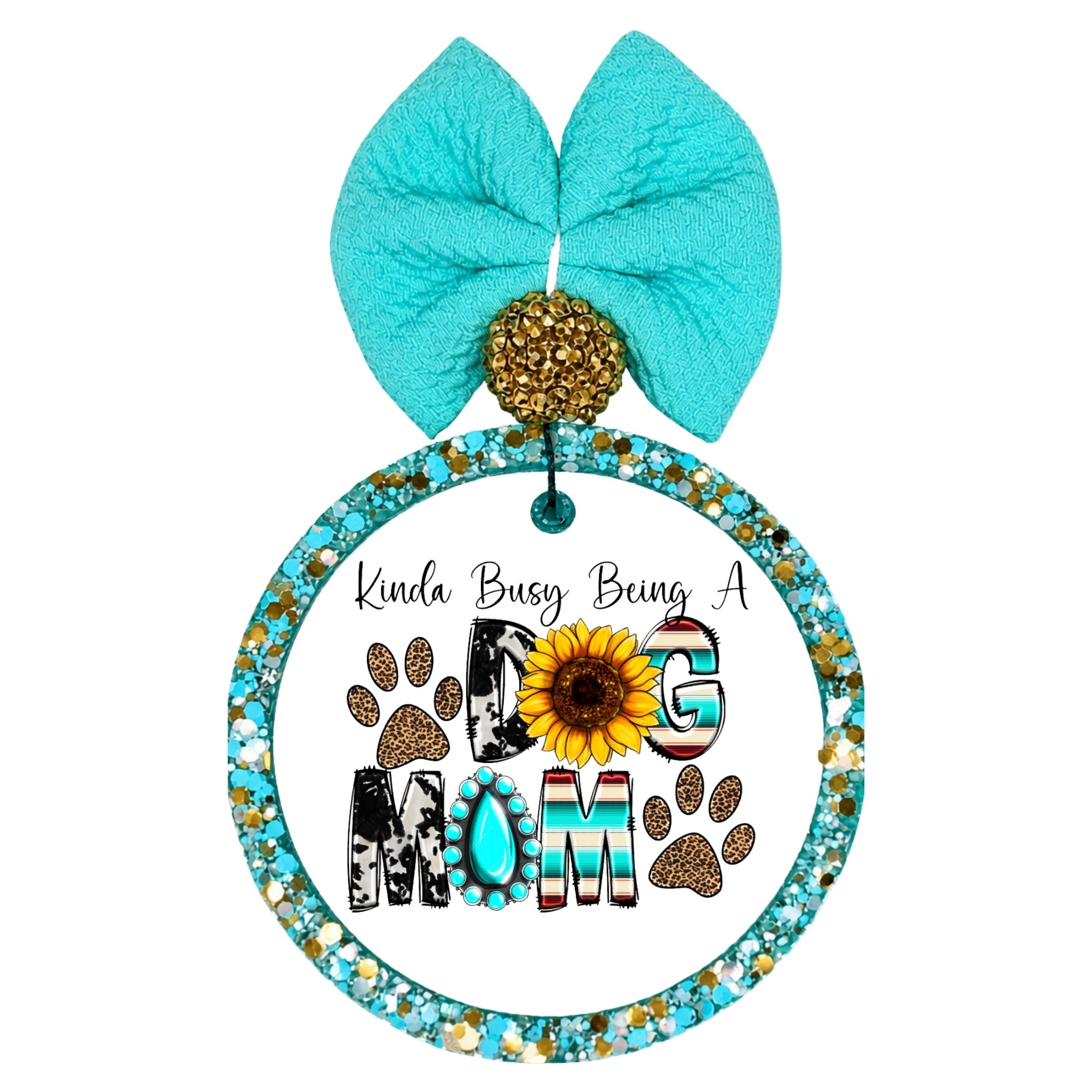 Kinda Busy Being a Dog Mom design with paw prints, sunflower, leopard print, and turquoise accents.
