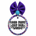 Good Moms Say Bad Words bold black quote with checker accents.