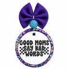 Good Moms Say Bad Words bold black quote with checker accents.