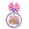 Nana script design with colorful flowers and purple checkerboard background.