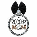 Soccer Mom design with leopard print lettering and black and white soccer ball.