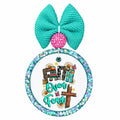 Faith Over Fear design with colorful patterned lettering, daisies, butterflies and wooden cross.