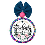 Perfectly Imperfect design with black script and soft floral arrangement.