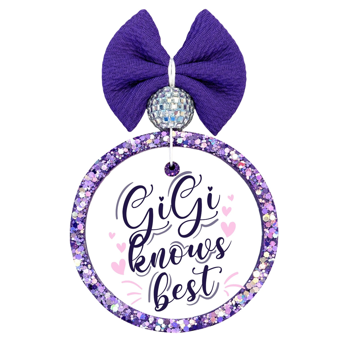 Gigi Knows Best purple script design with pink hearts.