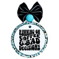 Running on coffee and bad decisions text with coffee cup graphic.