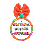 Emotional support coworker text in colorful lettering.