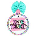 Over thinker text in colorful block lettering with stars.