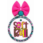 Softball mama text in leopard and bright yellow lettering with softball star accents.
