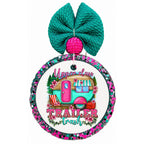 Upper class trailer trash text with colorful vintage camper and floral accents.