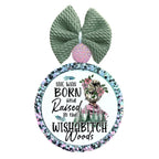 She was born and raised in the Wishabitch Woods text with woman, flowers, and pine trees.