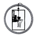 Black silhouette of a basketball hoop with a basketball at the rim.