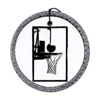 Black silhouette of a basketball hoop with a basketball at the rim.