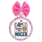 Coffee Makes Me Nicer text with iced coffee cup, pink checkers, flowers, and bows.
