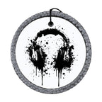 Black headphones silhouette with paint splatter accents.