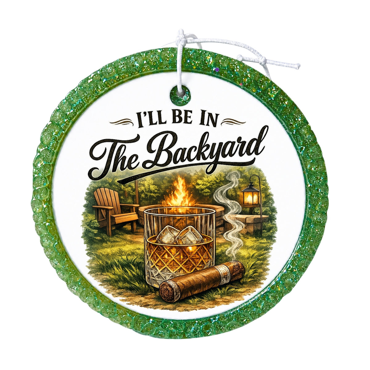 I'll Be in the Backyard text with a fire pit, whiskey glass, cigar, chair, and lantern.