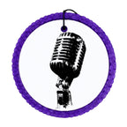 Black vintage microphone silhouette with distressed ink texture.