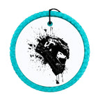 Black motorcycle helmet silhouette with paint splatter accents.