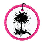 Black palm tree silhouette with paint splatter accents.