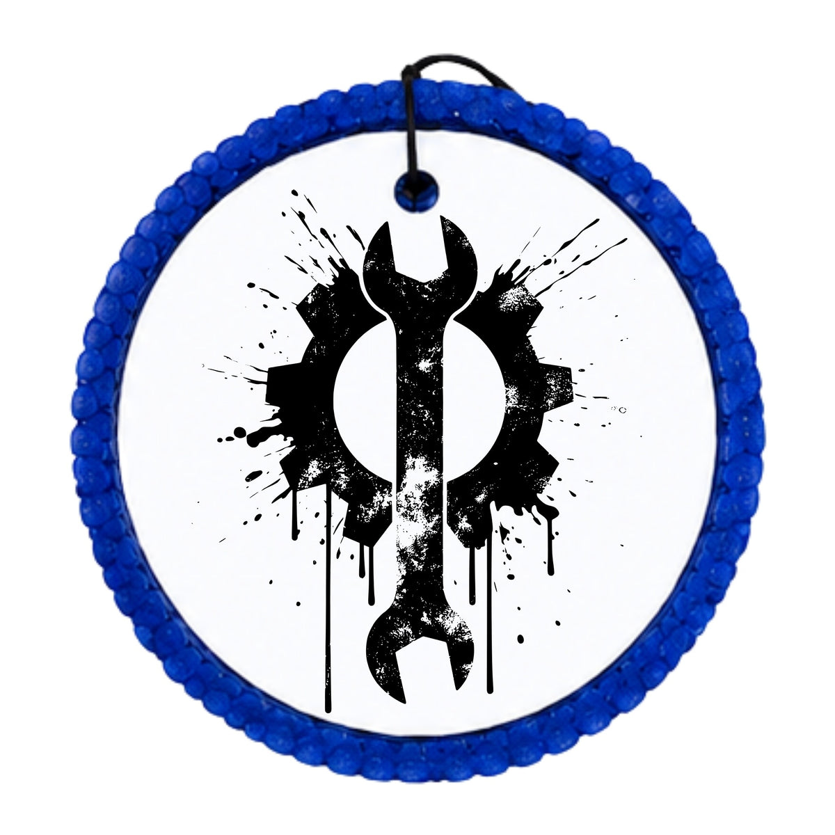 Black wrench and gear silhouette with distressed paint splatter accents.