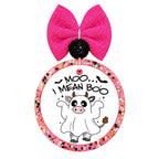 Moo I Mean Boo text with a cow dressed as a ghost and small bats.
