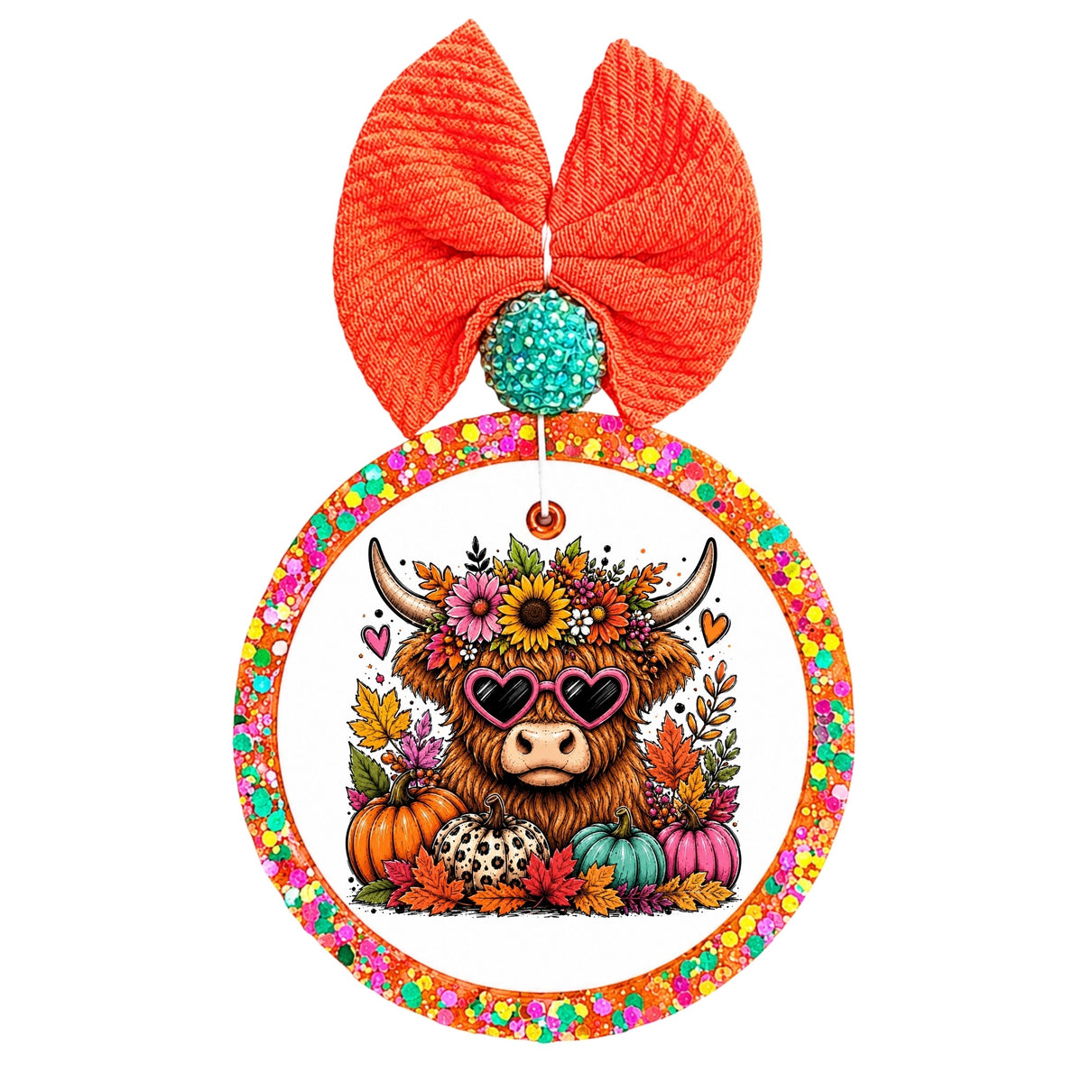 Highland cow wearing pink heart sunglasses surrounded by colorful fall flowers, leaves, and pumpkins.
