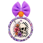 Floral skull with colorful flowers, crescent moon, stars, and black-and-white checker accents.