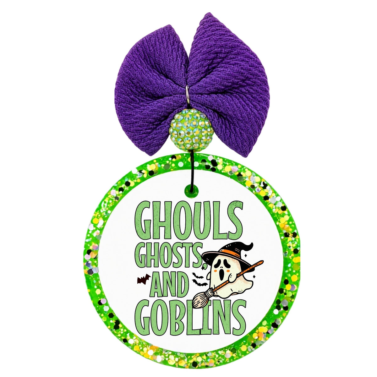 Ghouls Ghosts and Goblins text with a small ghost in a witch hat riding a broom.