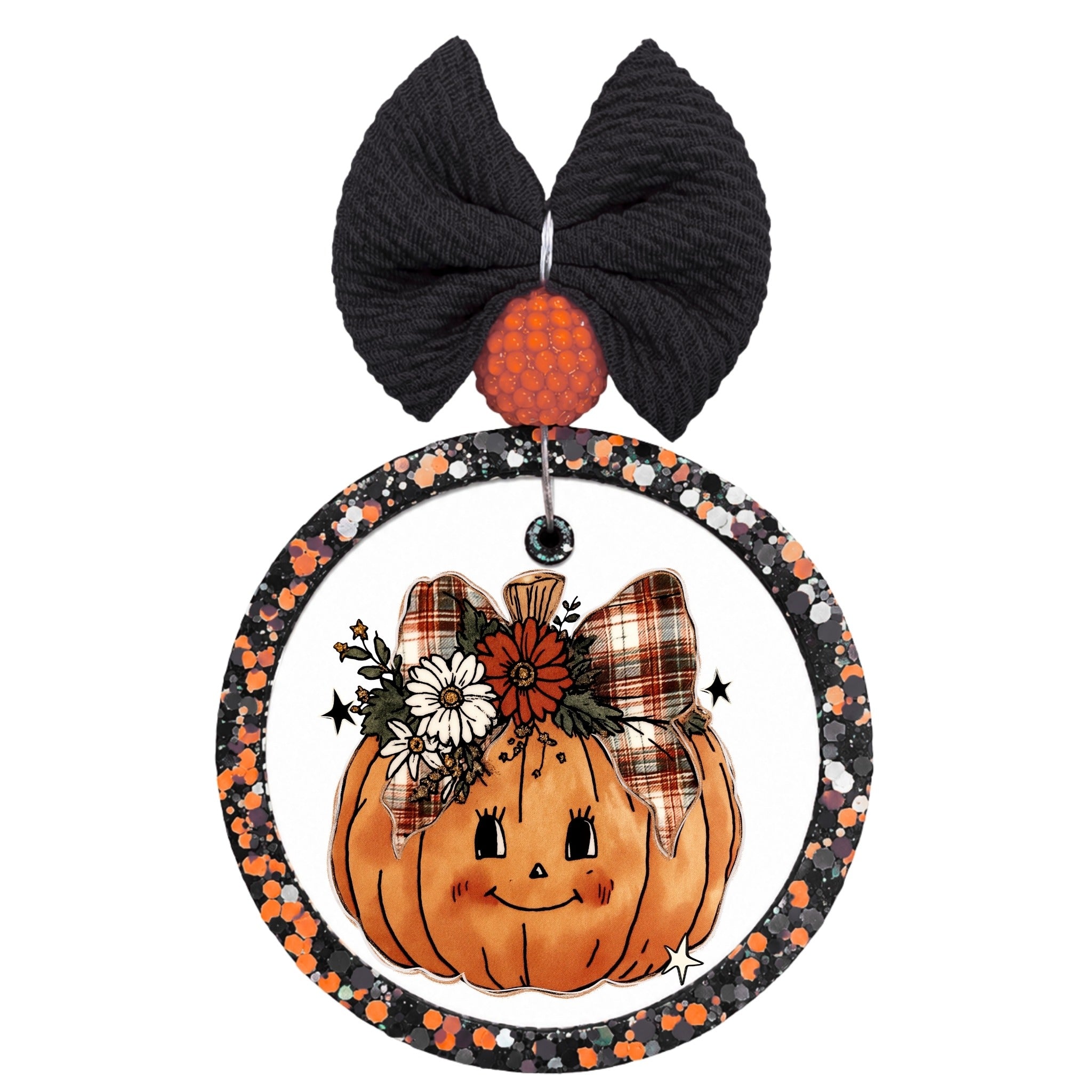 Smiling pumpkin with plaid bow, fall flowers, greenery, and sparkle accents.