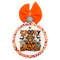 Cute Highland cow sitting on a jack-o-lantern with bats, pumpkins, stars, and Spooky Vibes text.