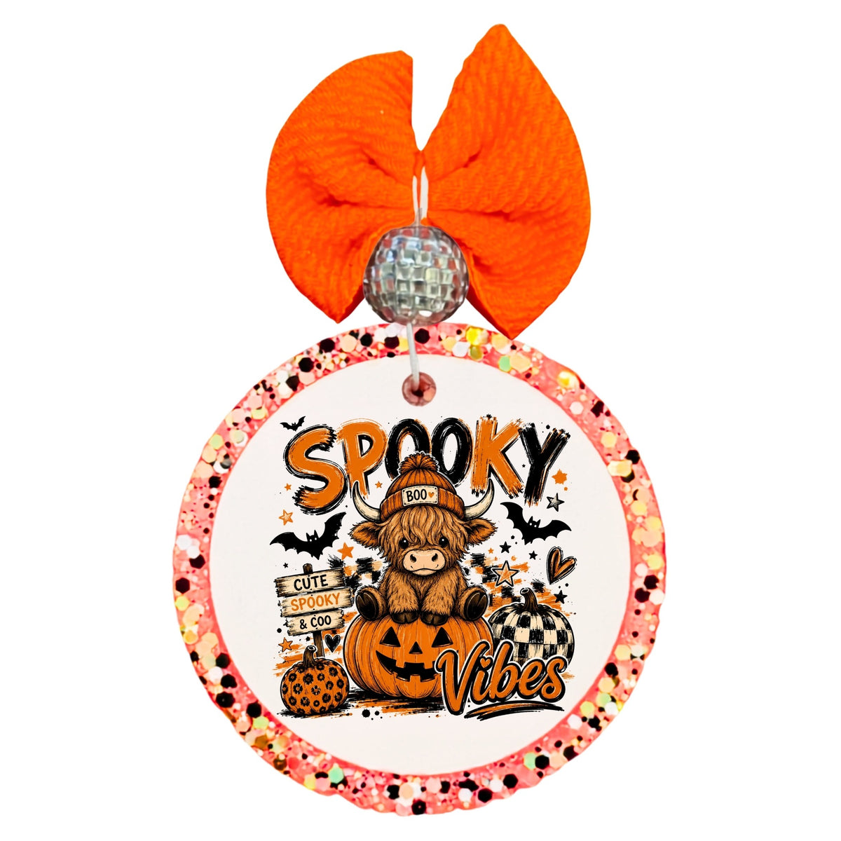 Cute Highland cow sitting on a jack-o-lantern with bats, pumpkins, stars, and Spooky Vibes text.