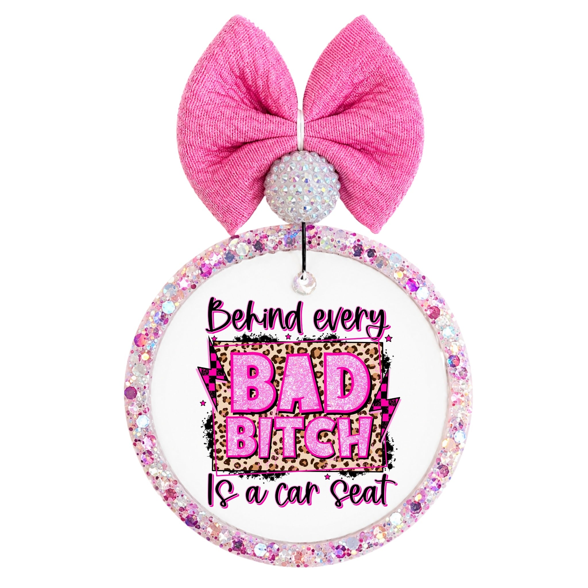 Bold pink and leopard quote saying Behind every bad bitch is a car seat.