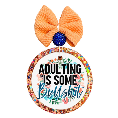 Floral wreath design with the words Adulting is some bullshit.