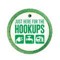RV camping design saying Just here for the hookups with electric, water and camper icons.