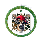 Deer wearing sunglasses and a red cap over a camouflage background.