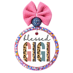 Blessed Gigi lettering with leopard print and muted pink, teal and rust color blocks.