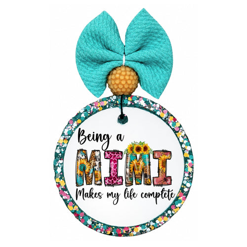 Colorful floral lettering that says Being a Mimi Makes My Life Complete.