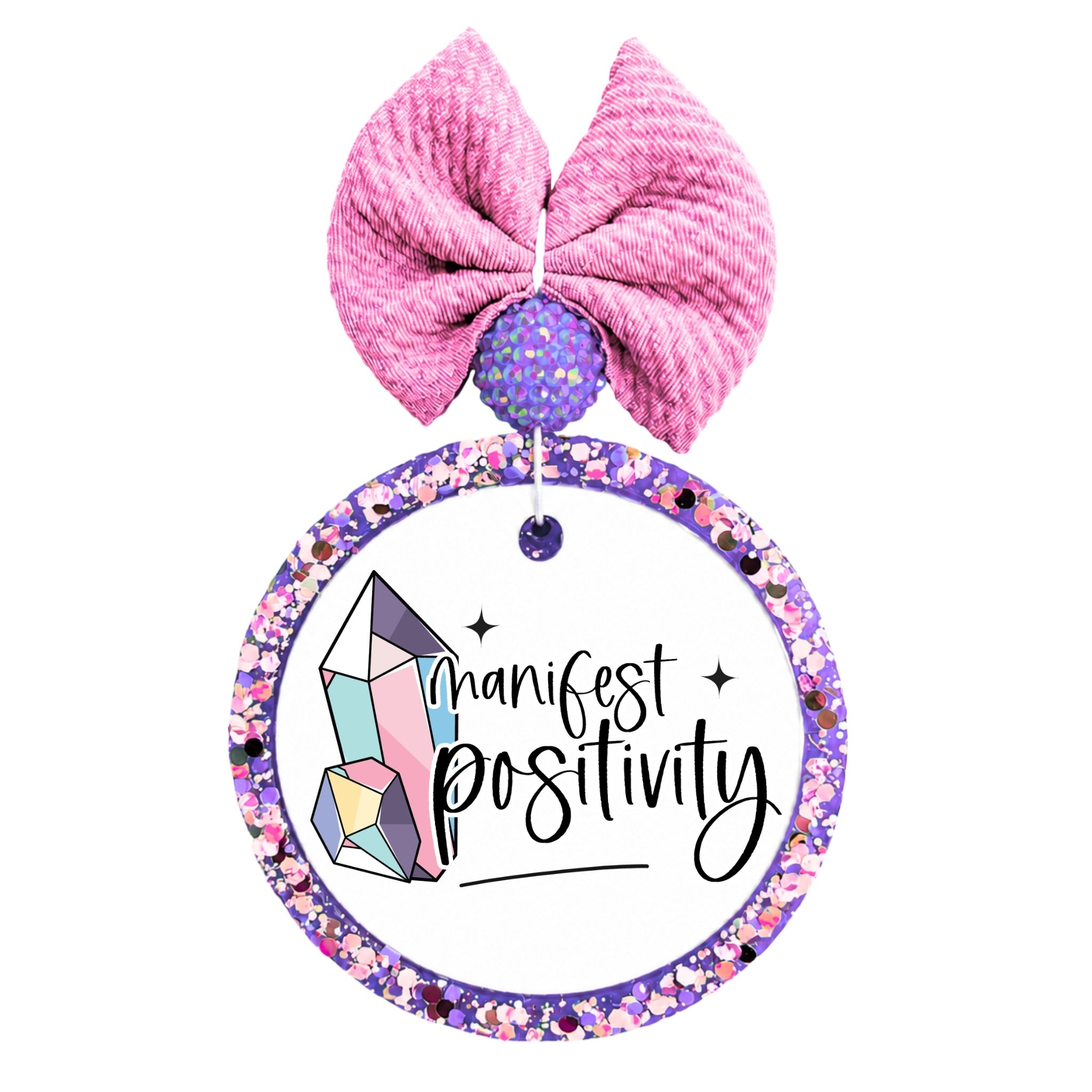 Crystal design with the words Manifest Positivity.