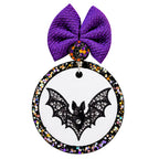 Black bat with outstretched wings filled with silver jewel-style details.