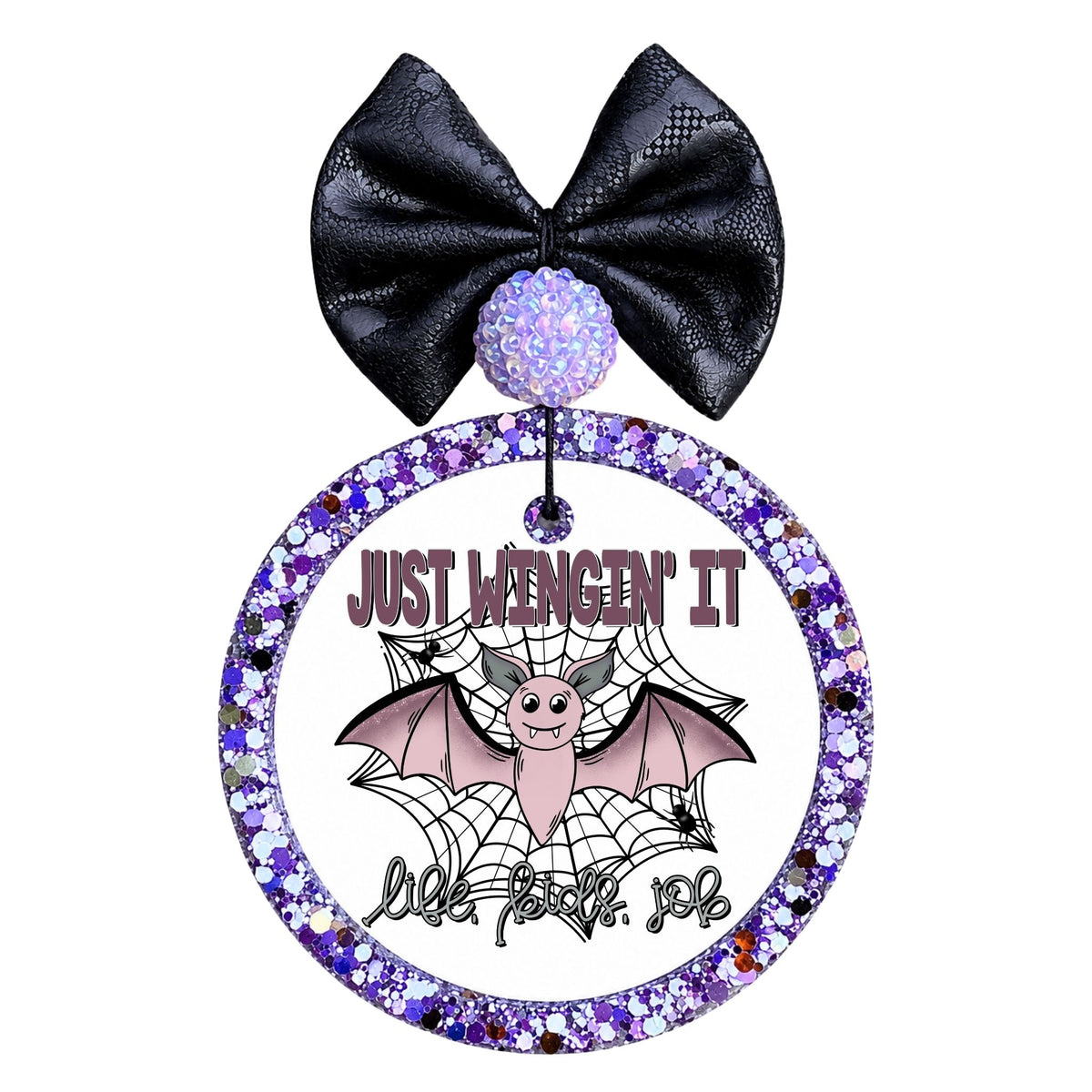 Just wingin' it lettering above a pink bat and spiderweb, with life, kids, and job written below.