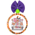 Bad witch vibes in pink and orange lettering with bats, stars, skeletal hands, and a black-and-white checkerboard.