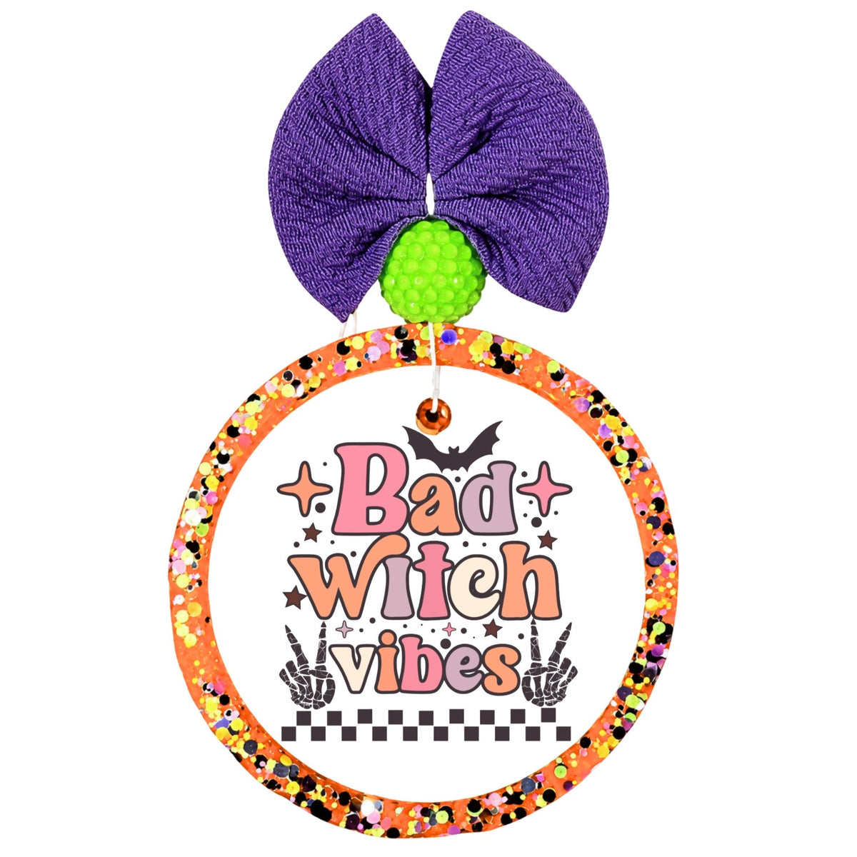 Bad witch vibes in pink and orange lettering with bats, stars, skeletal hands, and a black-and-white checkerboard.