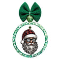 Santa with a curled gray beard, black-and-white checkered sunglasses, and a red-and-black plaid hat.
