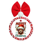 Merry Christmas lettering around a shaggy Highland cow wearing a Santa hat, surrounded by festive greenery and snowflakes.