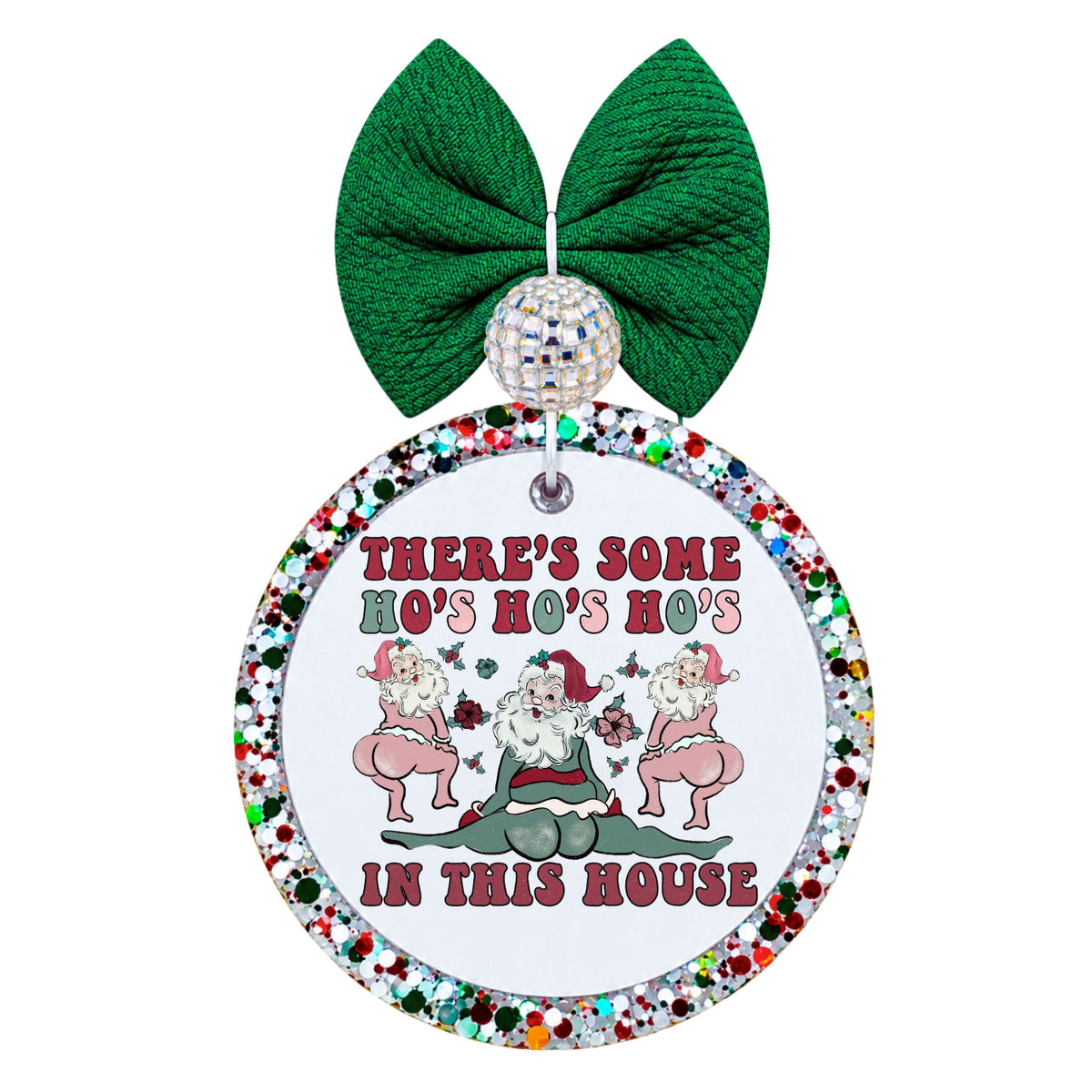 Three dancing Santas in pink and green with there’s some ho’s in this house lettering.