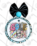 Colorful 'GOLF MOM' ornament with a black bow and blue ball on a white background.