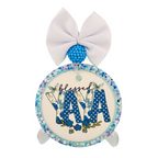 Blessed Yaya lettering with blue polka dots, pale floral letters, butterflies and small flowers.